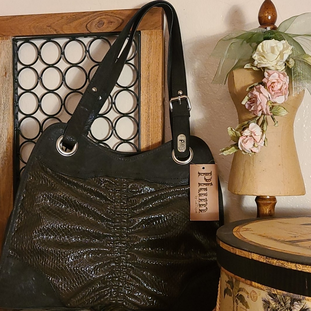 Brown handbag from Plum. NWT